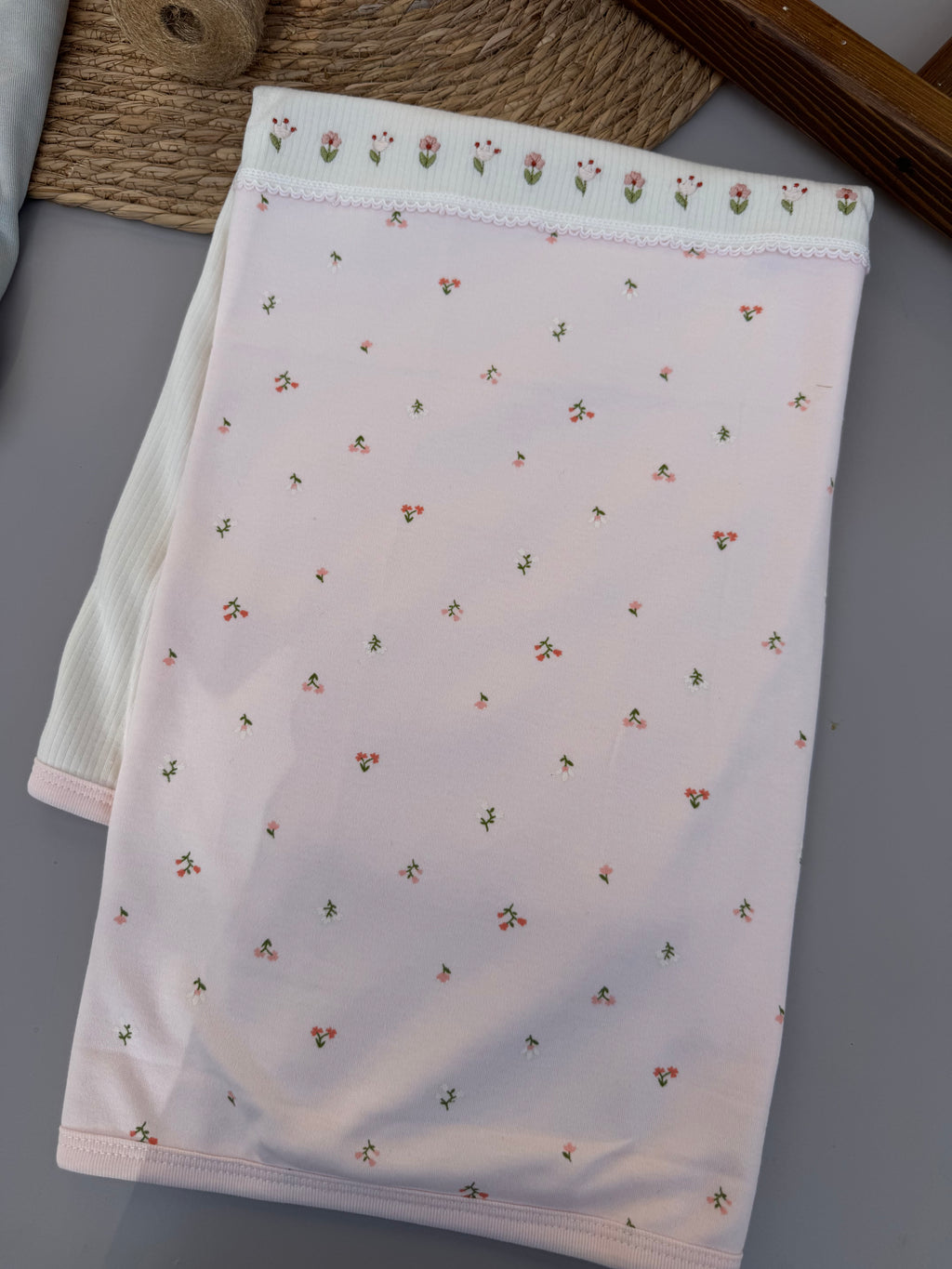 Pink and white flowers blanket