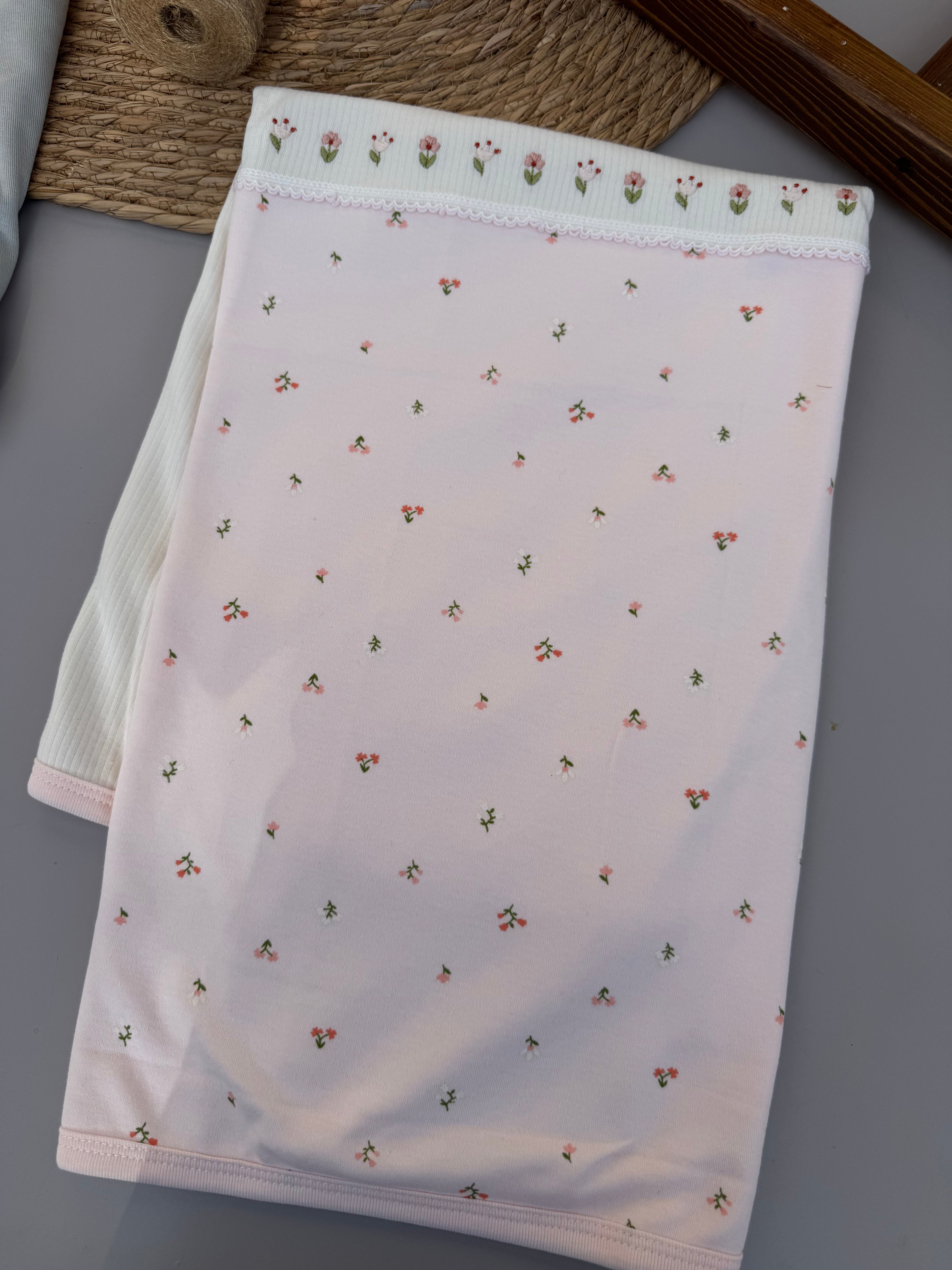 Pink and white flowers blanket
