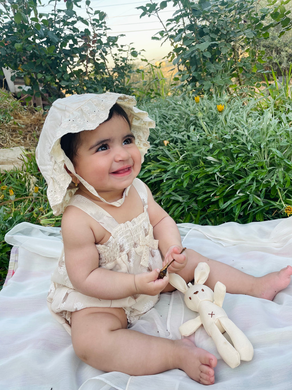 Beige muslin romper with hat