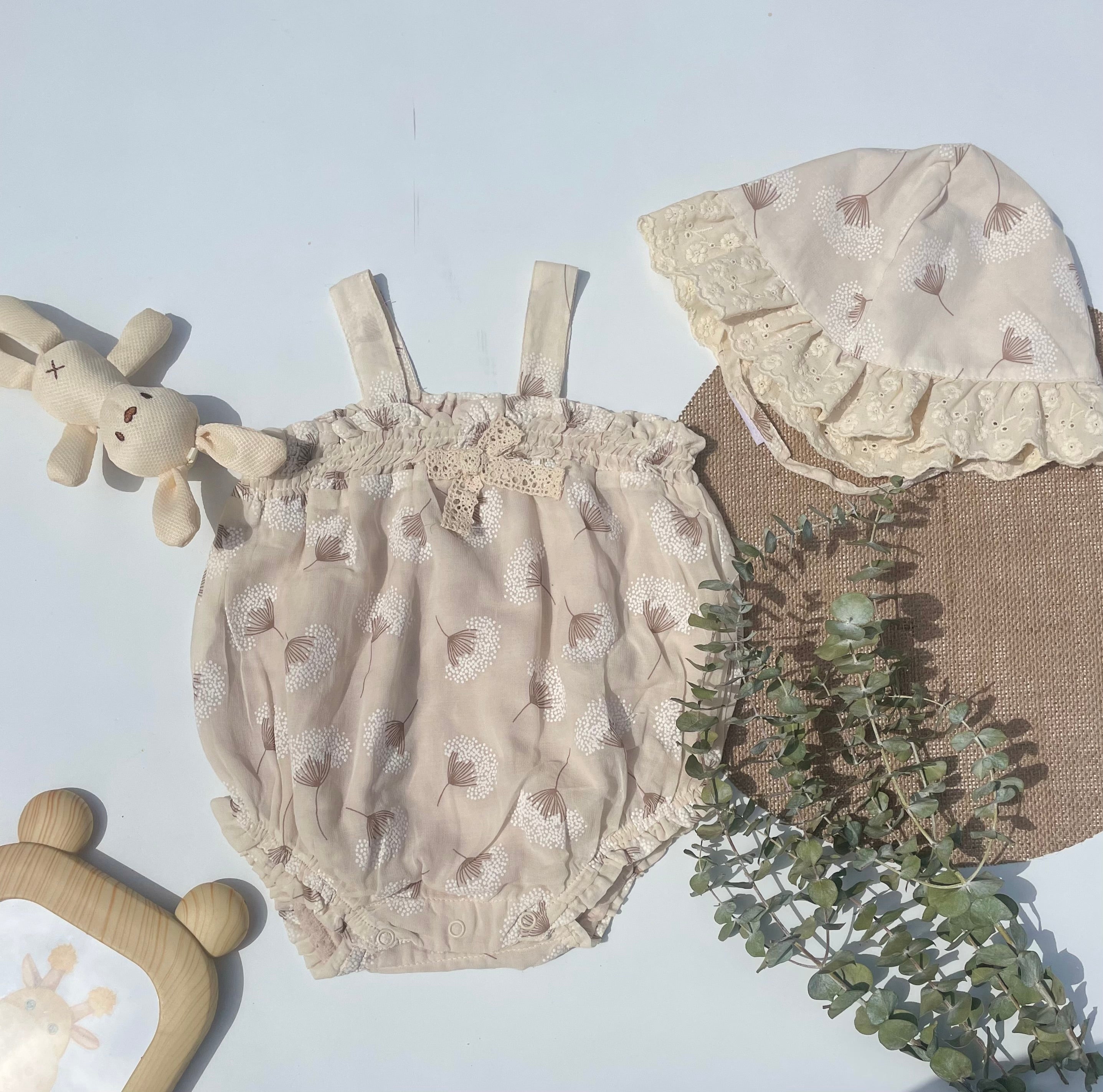 Beige muslin romper with hat