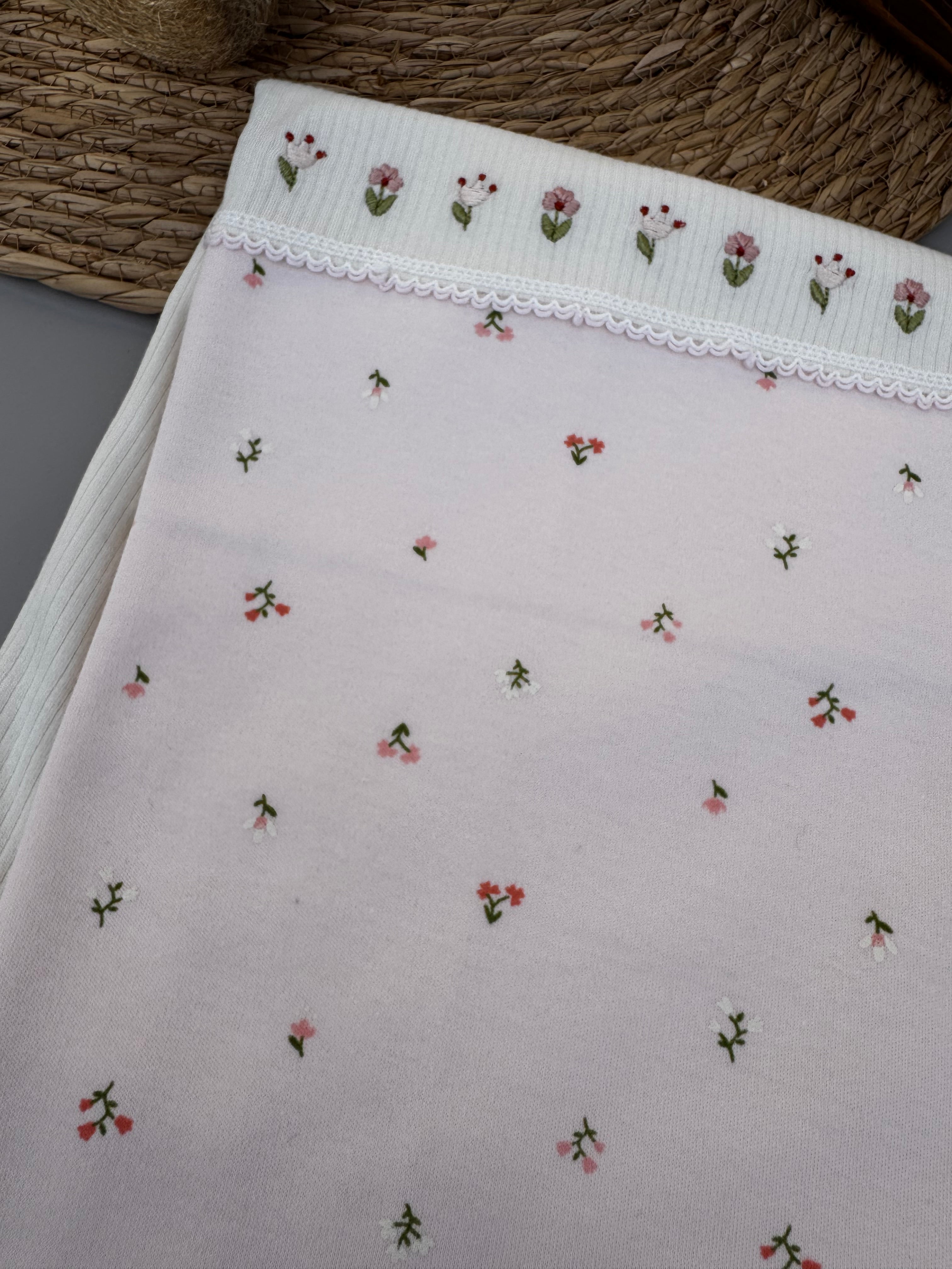 Pink and white flowers blanket