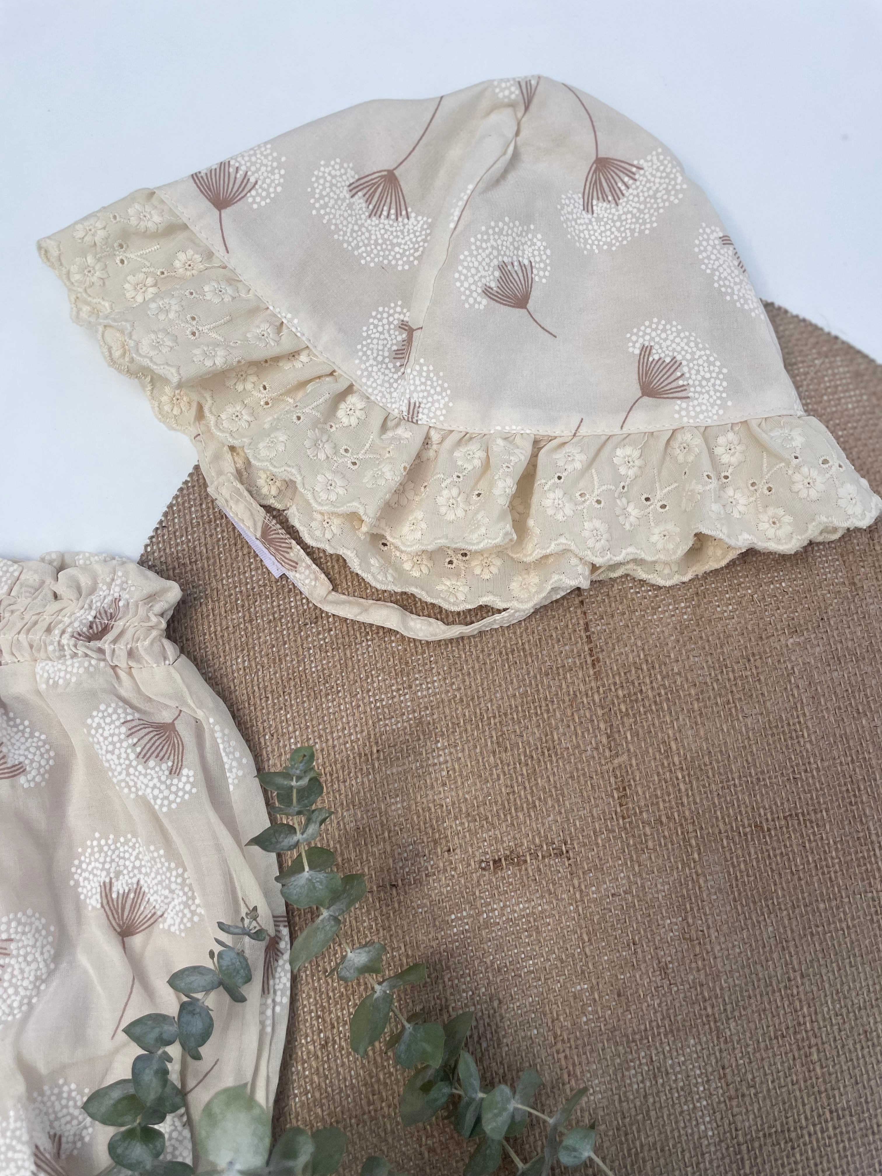 Beige muslin romper with hat